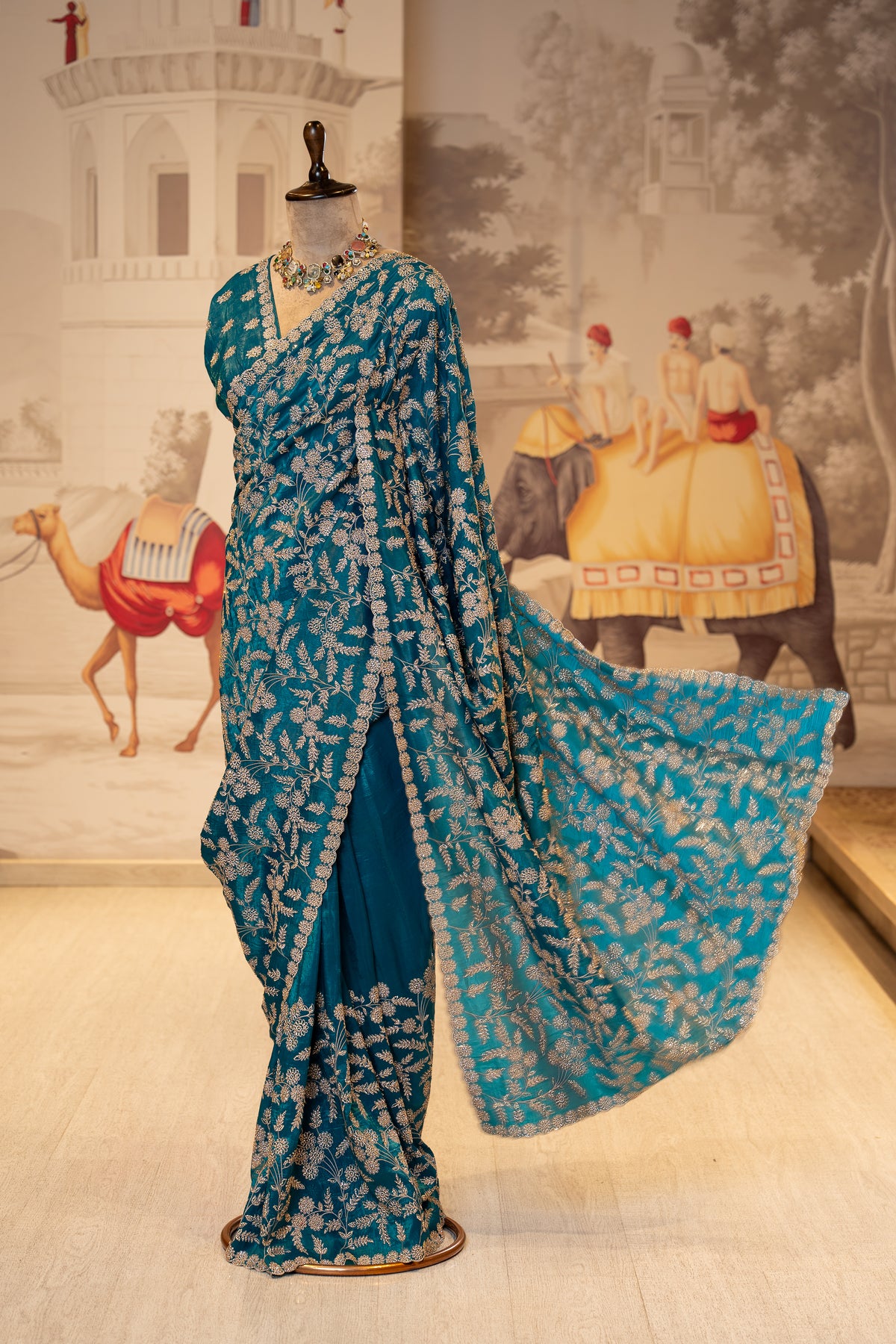 Teal Blue Thread And Stone Work Unstitched Saree