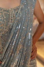 Ice Blue Net Sequin Embroidered Drape Saree with Blouse